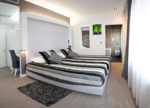 Imagen de la habitación del Hotel Authentic Luxury Rooms. Foto 15