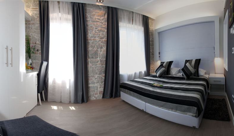 Imagen de la habitación del Hotel Authentic Luxury Rooms. Foto 16