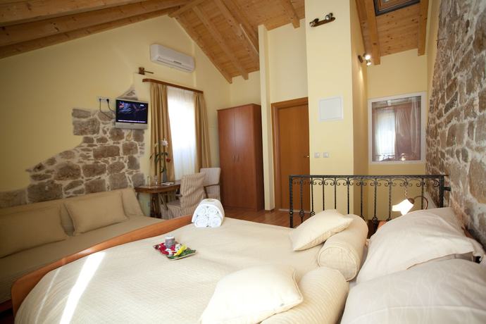 Imagen de la habitación del Hotel Authentic Luxury Rooms. Foto 17