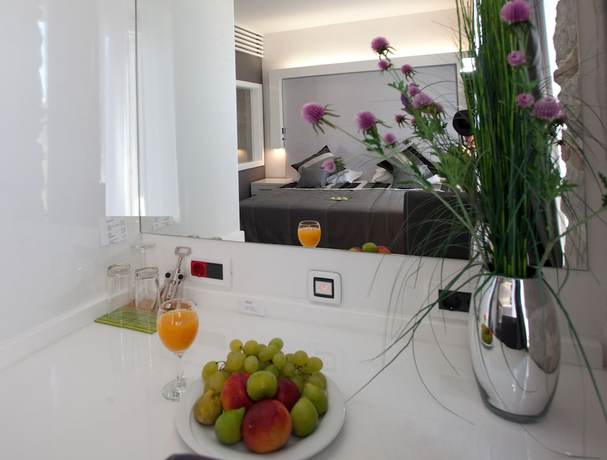 Imagen de la habitación del Hotel Authentic Luxury Rooms. Foto 18