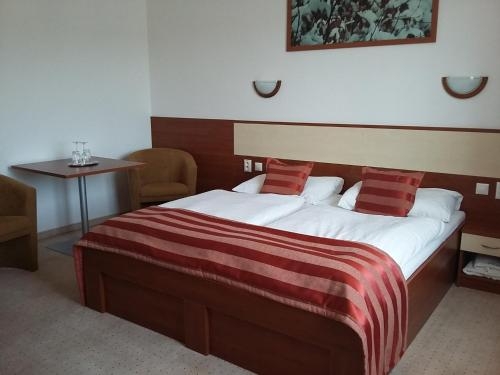 Imagen de la habitación del Hotel Auto Jas. Foto 8