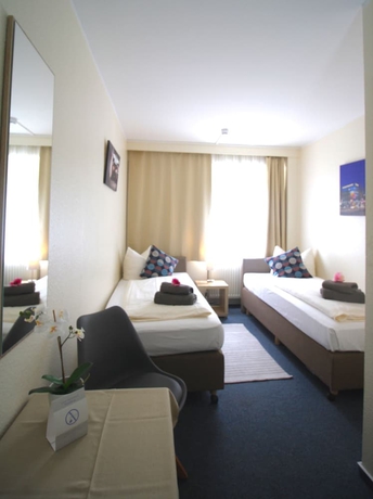 Imagen de la habitación del Hotel Auto-parkhotel. Foto 10