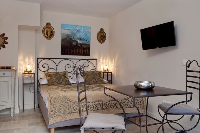 Imagen de la habitación del Hotel Aux Augustins Palais des Papes and Wellness. Foto 14