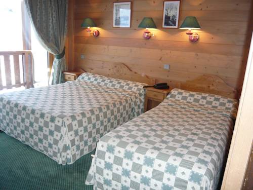 Imagen de la habitación del Hotel Aux Ducs De Savoie. Foto 5