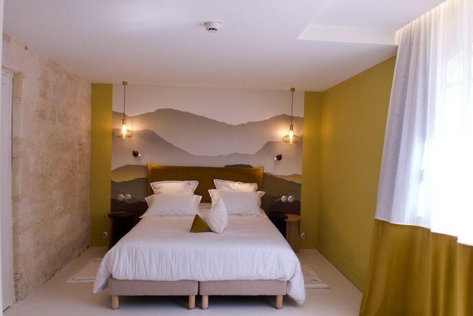 Imagen de la habitación del Hotel Aux Ducs De Sienne. Foto 13