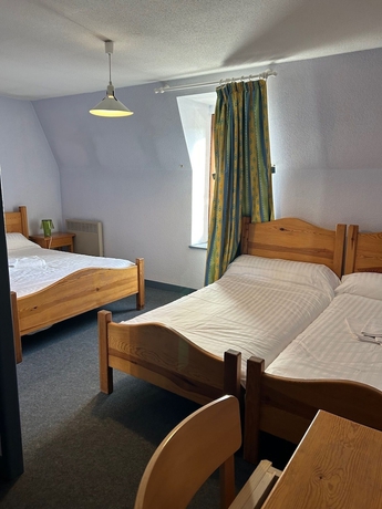 Imagen de la habitación del Hotel Aux Globe-Trotters. Foto 2