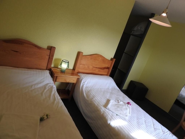 Imagen de la habitación del Hotel Aux Globe-Trotters. Foto 7