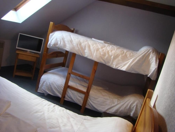 Imagen de la habitación del Hotel Aux Globe-Trotters. Foto 15