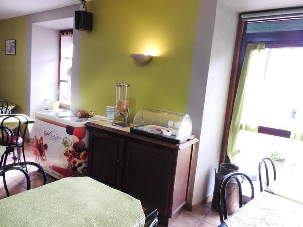 Imagen del bar/restaurante del Hotel Aux Globe-Trotters. Foto 1