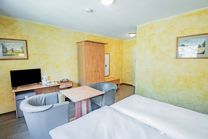 Imagen de la habitación del Hotel Aux Tanneries de Wiltz. Foto 17