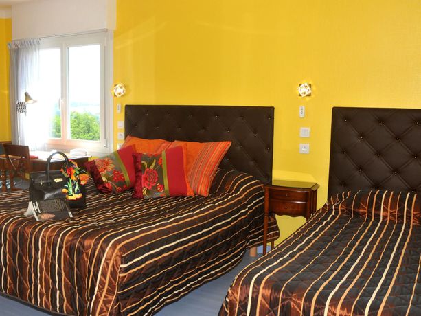 Imagen de la habitación del Hotel Aux Tauzins. Foto 11