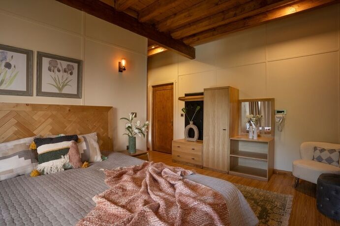 Imagen de la habitación del Hotel Avalon Cottages Kanatal. Foto 13