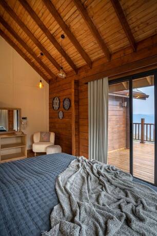 Imagen de la habitación del Hotel Avalon Cottages Kanatal. Foto 18