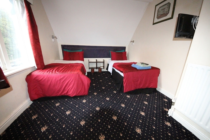 Imagen de la habitación del Hotel Avalon Guest House. Foto 10