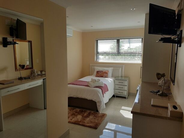 Imagen de la habitación del Hotel Avalon Lodge. Foto 11