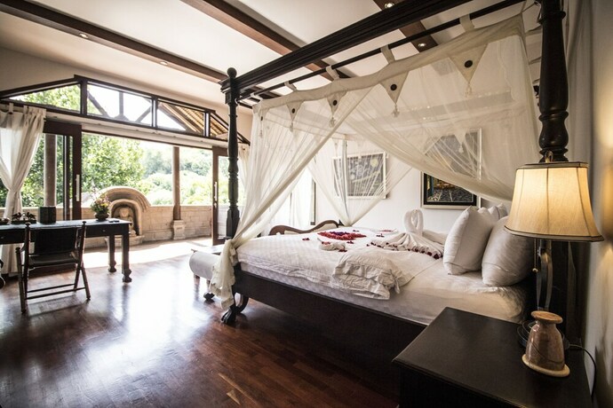 Imagen de la habitación del Hotel Avalon Ubud Villas. Foto 24