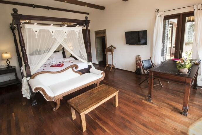 Imagen de la habitación del Hotel Avalon Ubud Villas. Foto 26