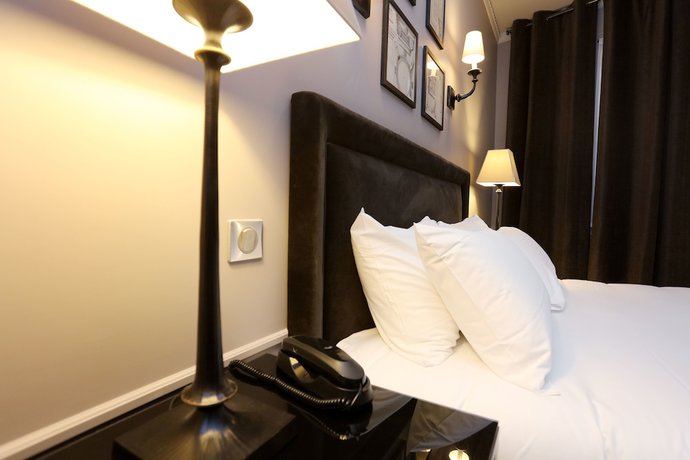 Imagen de la habitación del Hotel Avama Montmartre. Foto 14