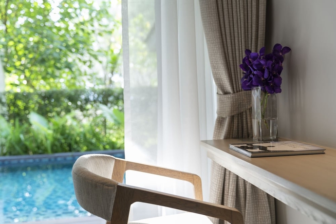 Imagen de la habitación del Hotel Avani+ Khao Lak Resort. Foto 19