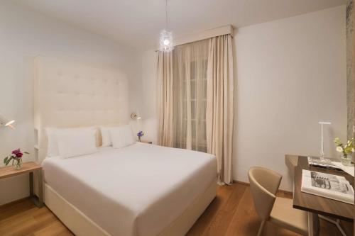 Imagen de la habitación del Hotel Avani Palazzo Moscova Milan. Foto 14