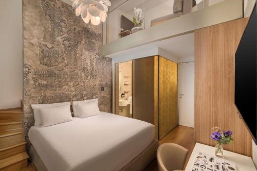 Imagen de la habitación del Hotel Avani Palazzo Moscova Milan. Foto 16