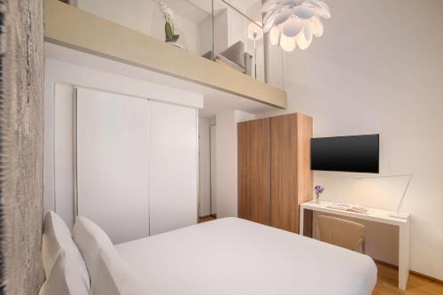 Imagen de la habitación del Hotel Avani Palazzo Moscova Milan. Foto 19