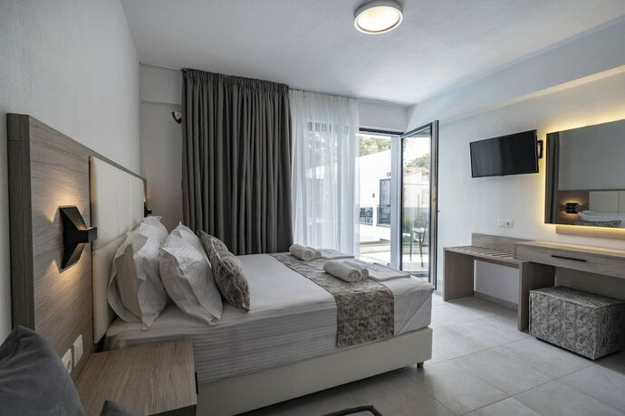 Imagen de la habitación del Hotel Avaton Luxury Resort. Foto 16