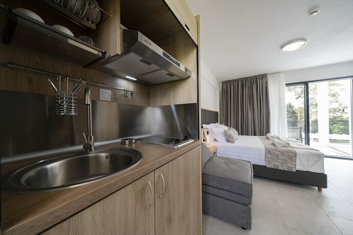 Imagen de la habitación del Hotel Avaton Luxury Resort. Foto 17