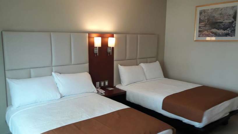 Imagen de la habitación del Hotel Ave Inn. Foto 11