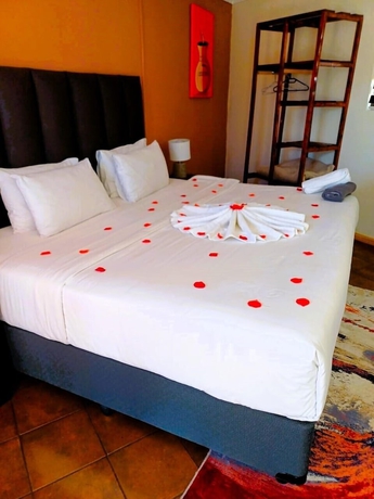 Imagen de la habitación del Hotel Avela Lodge. Foto 7