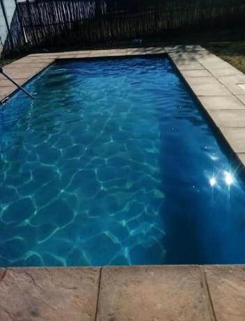 Imagen de la piscina del Hotel Avela Lodge. Foto 15