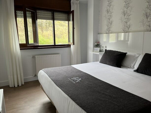 Imagen de la habitación del Hotel Avelina. Foto 18