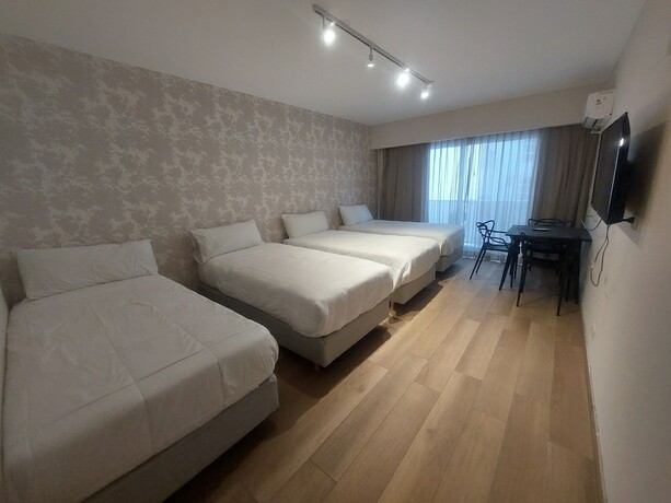 Imagen de la habitación del Hotel Avellaneda Aparts and Suites. Foto 16