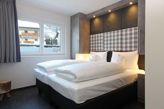 Imagen de la habitación del Hotel AvenidA Mountain Lodges Kaprun. Foto 4