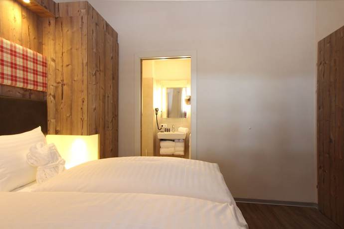 Imagen de la habitación del Hotel AvenidA Mountain Lodges Kaprun. Foto 5