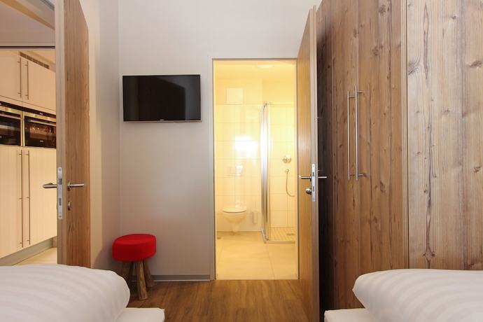 Imagen de la habitación del Hotel AvenidA Mountain Lodges Kaprun. Foto 6