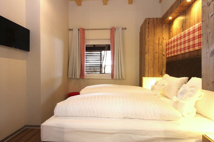 Imagen de la habitación del Hotel AvenidA Mountain Lodges Kaprun. Foto 7