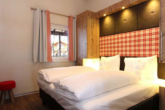 Imagen de la habitación del Hotel AvenidA Mountain Lodges Kaprun. Foto 10