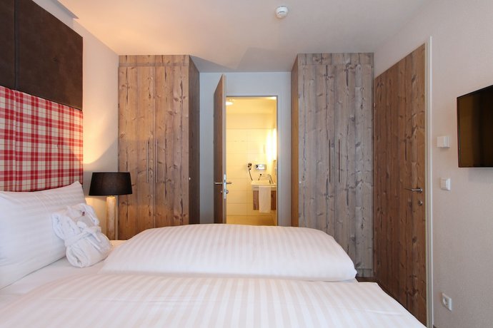 Imagen de la habitación del Hotel AvenidA Mountain Lodges Kaprun. Foto 12