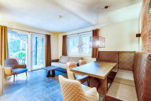 Imagen de la habitación del Hotel Avenida Mountain Lodges Saalbach. Foto 2