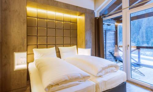 Imagen de la habitación del Hotel Avenida Mountain Lodges Saalbach. Foto 8