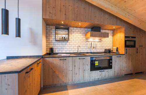 Imagen de la habitación del Hotel Avenida Panorama Suites Kaprun. Foto 15