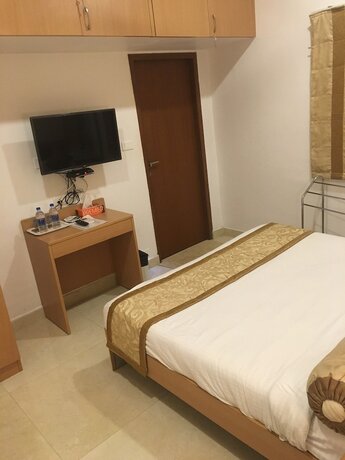 Imagen de la habitación del Hotel Avenue 11 Boutique Residences. Foto 17