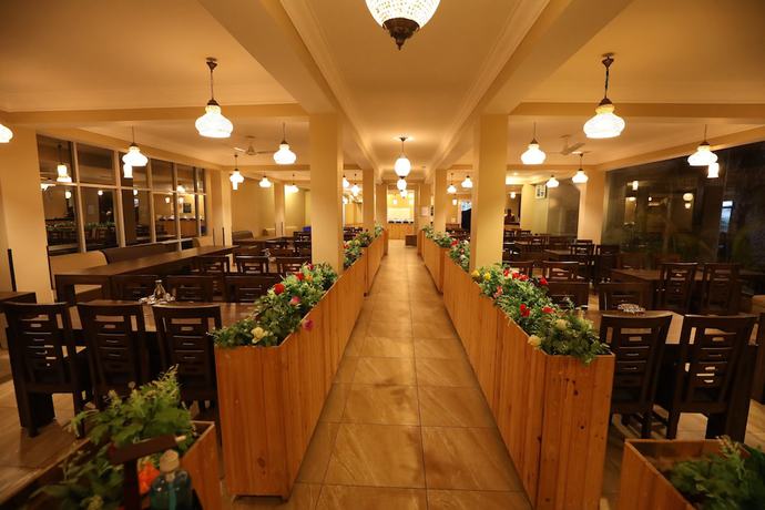 Imagen del bar/restaurante del Hotel Avenue 18 Resort. Foto 4