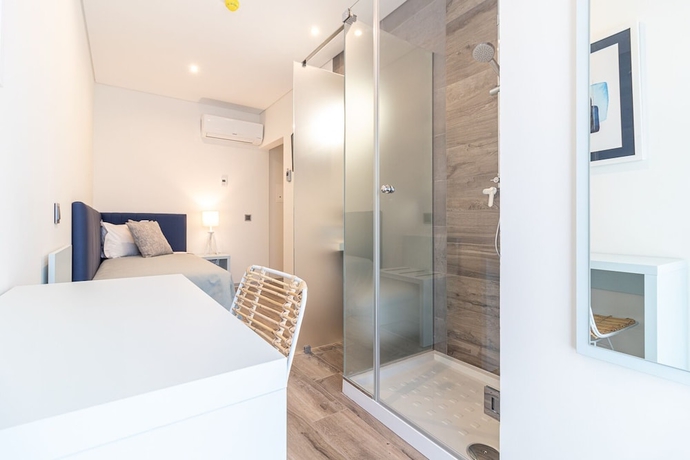 Imagen de la habitación del Hotel Avenue 41 Guest House. Foto 12