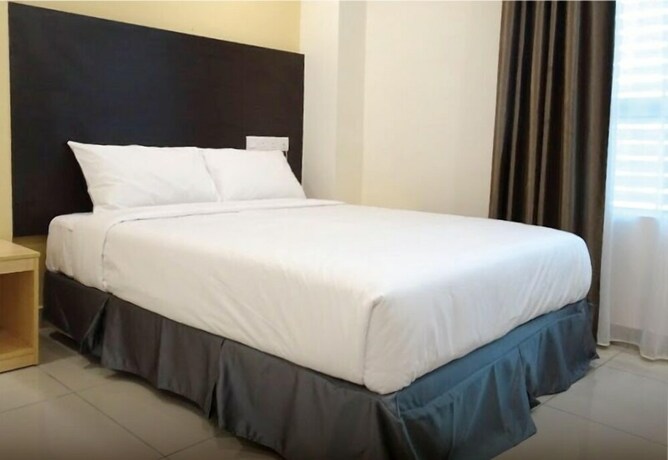 Imagen de la habitación del Hotel Avenue Bangi Hotel. Foto 3