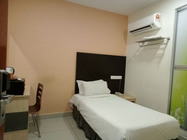Imagen de la habitación del Hotel Avenue Bangi Hotel. Foto 4