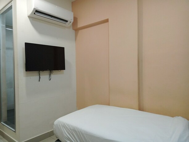 Imagen de la habitación del Hotel Avenue Bangi Hotel. Foto 9