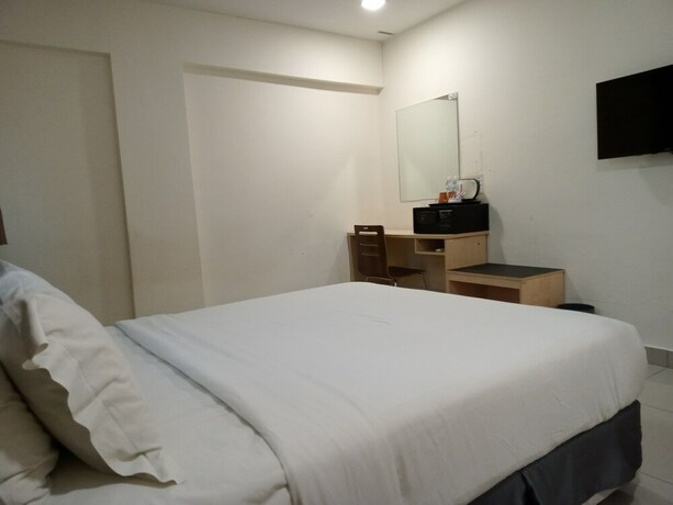 Imagen de la habitación del Hotel Avenue Bangi Hotel. Foto 10