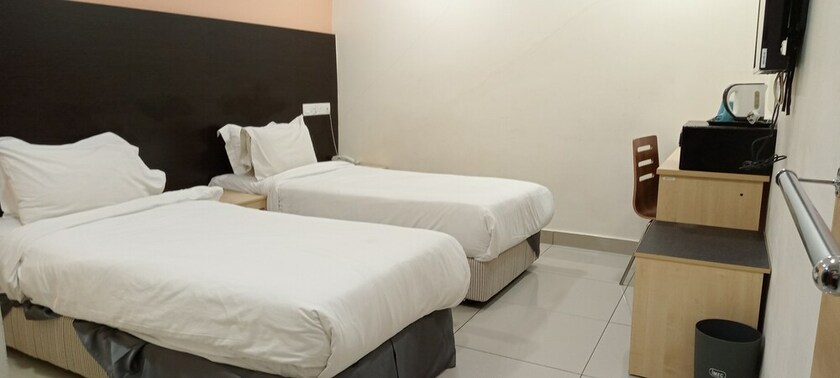 Imagen de la habitación del Hotel Avenue Bangi Hotel. Foto 11